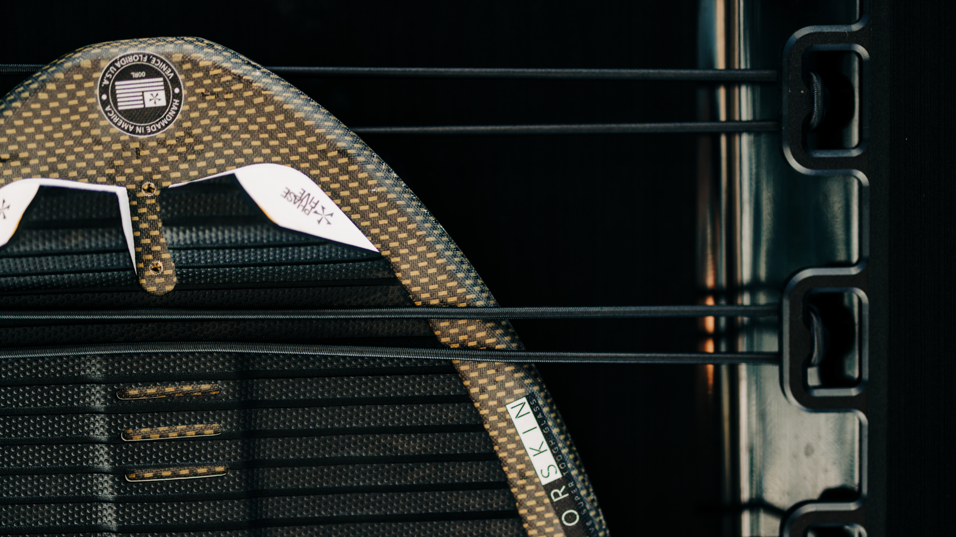 Storage for up to 10 boards, wireless phone chargers, and a locking compartment